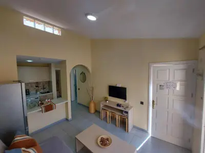 Una televisión o centro de entretenimiento en Tisalaya Park stay, cosy apartment in Maspalomas