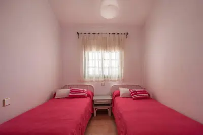 Cama o camas de una habitación en Dúplex con jardín y buenas vistas