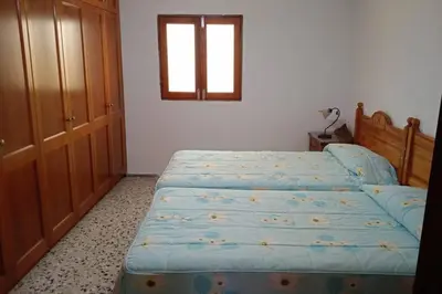 Cama o camas de una habitación en Vivienda Vacacional Casa Uca