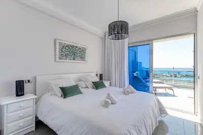 Cama o camas de una habitación en BeachFront in Puerto Mogán