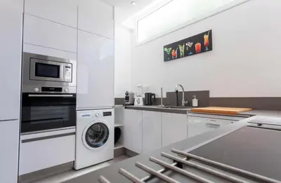 Una cocina o zona de cocina en Villa Palm Breeze