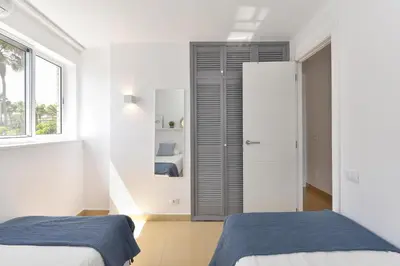 Cama o camas de una habitación en Apartment Oasis CM18 by VillaGranCanaria