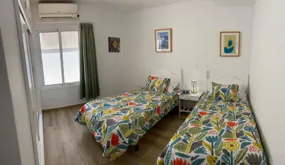 Cama o camas de una habitación en Villa Orquidea with private garden