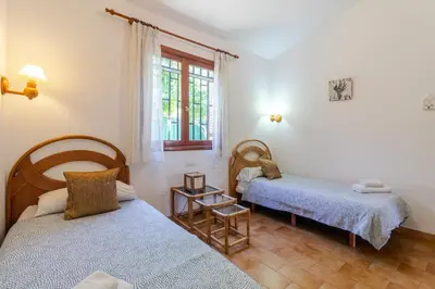 Cama o camas de una habitación en Bungalow Calma Masase