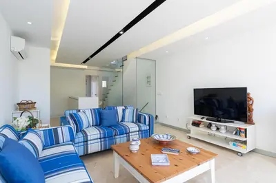Una televisión o centro de entretenimiento en BLUE MARLIN 14