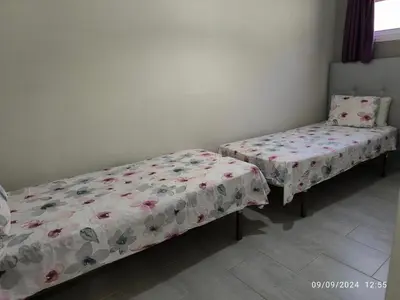 Cama o camas de una habitación en GC BEACH