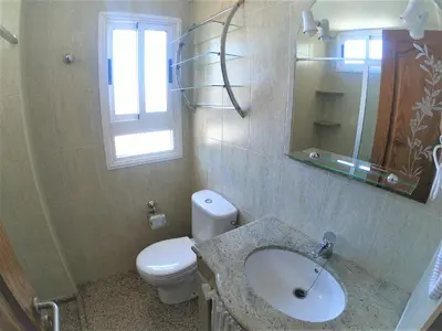 Un baño de Céntrico Tinache by CASAS COCODRILO