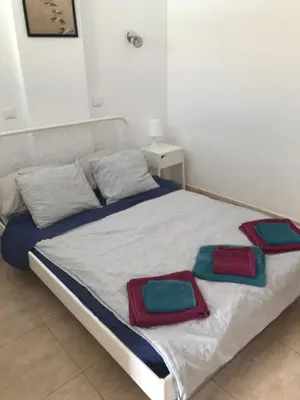 Cama o camas de una habitación en Yumbo Beach Apartment Perfect location free fast WIFI
