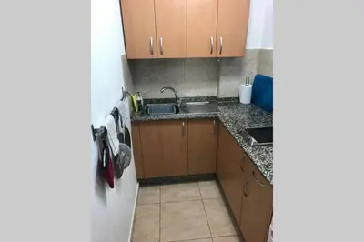 Una cocina o zona de cocina en Yumbo Beach Apartment Perfect location free fast WIFI