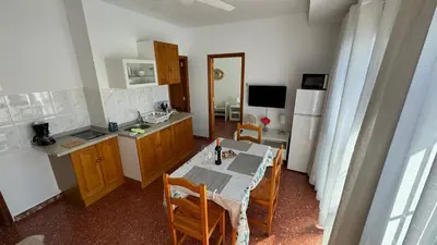 Una cocina o zona de cocina en Vivienda Vacacional Tienda Loly