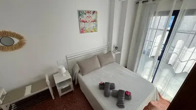 Cama o camas de una habitación en Vivienda Vacacional Tienda Loly