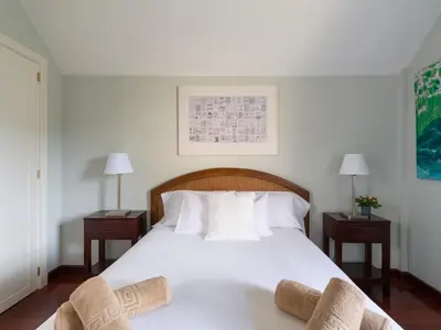 Cama o camas de una habitación en House with cozy garden BBQ and free parking