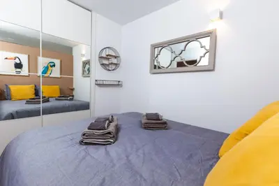 Cama o camas de una habitación en Yumbo Teror Two Bedroom Apartment