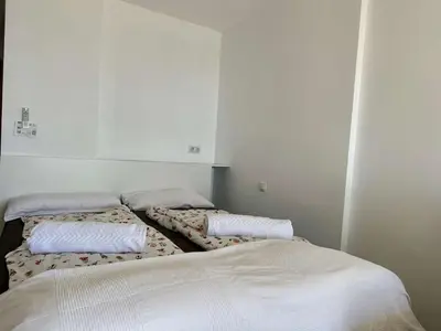 Cama o camas de una habitación en Studios für 2 Personen am Strand