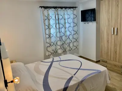 Cama o camas de una habitación en Arguineguin Beach Lux Solarium Suit