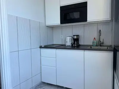 Una cocina o zona de cocina en Studio Am Strand