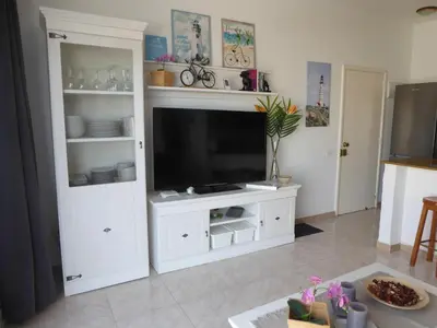 Una televisión o centro de entretenimiento en Ferienwohnung mit grandioser Aussicht