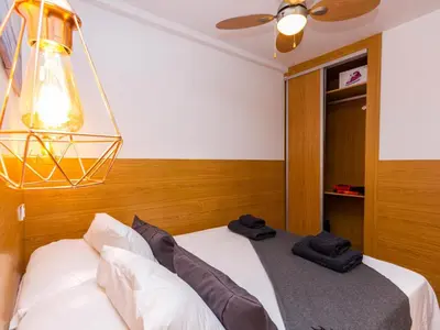 Cama o camas de una habitación en Swimsuit Friendly Holiday Home