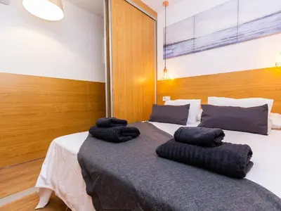 Cama o camas de una habitación en Swimsuit Friendly Holiday Home