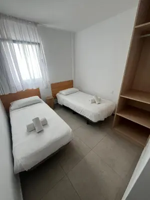 Cama o camas de una habitación en La Puntilla Arena