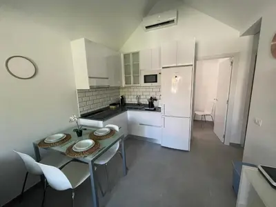 Una cocina o zona de cocina en Bungalow silencioso y agradable