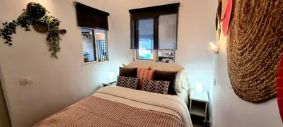 Cama o camas de una habitación en ARGUINEGUIN, two bedrooms bungalow, pool & wifi