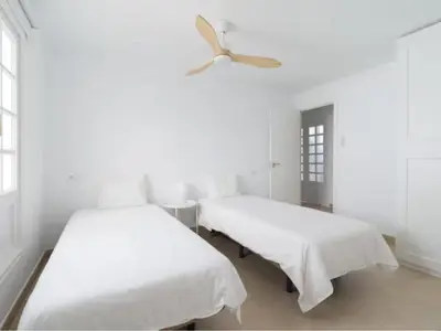 Cama o camas de una habitación en Pasitoblanco Porto Mare 45 Seaview Villa prívate heated pool