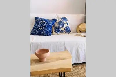 Cama o camas de una habitación en PHARUS retro beach home New Heated Pool