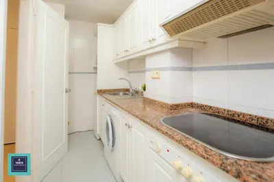 Una cocina o zona de cocina en Maria Rosa Urban & Beach Apartment