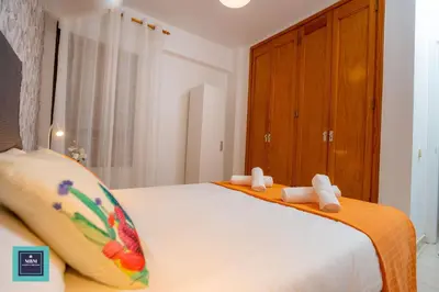 Cama o camas de una habitación en Maria Rosa Urban & Beach Apartment