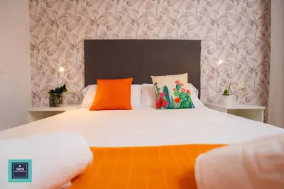 Cama o camas de una habitación en Maria Rosa Urban & Beach Apartment