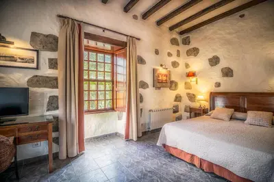 Cama o camas de una habitación en Hotel Rural LIVVO Maipez