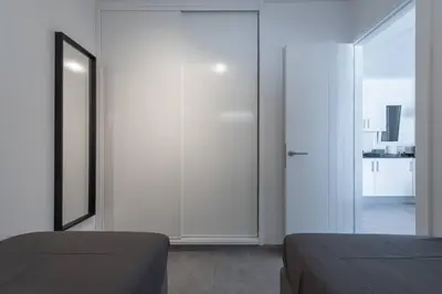 Cama o camas de una habitación en Casa Johan - apartamento con soprendentes vistas y terraza ajardinada