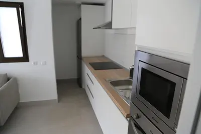 Una cocina o zona de cocina en Precioso Bungalow en complejo privado con piscina