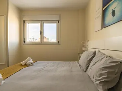 Cama o camas de una habitación en GuestReady - Nuevos Livian Suites Las Palmas