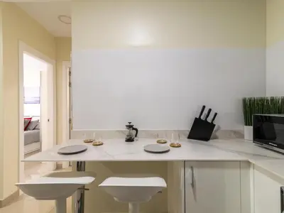 Una cocina o zona de cocina en GuestReady - Nuevos Livian Suites Las Palmas