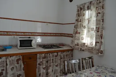Una cocina o zona de cocina en Casa de Diego y Mela