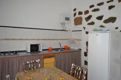 Una cocina o zona de cocina en Casa de Diego y Mela