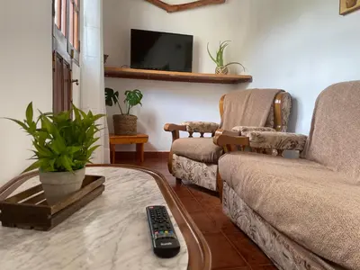 Una televisión o centro de entretenimiento en Casa El Conde