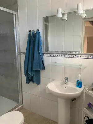 Un baño de Villa Bahamas private heated pool close to town.