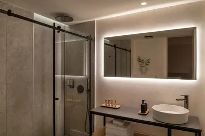 Un baño de TocToc Suites Olof Palme - Viviendas Vacacionales