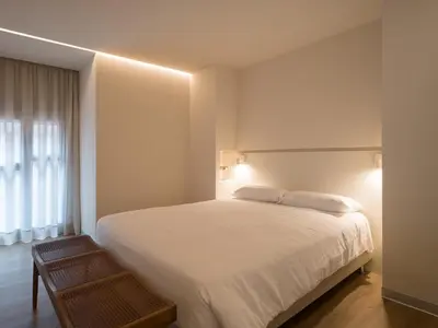 Cama o camas de una habitación en Luxury Bakus Canteras Beach