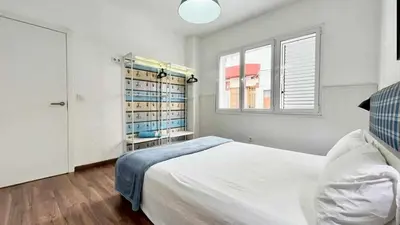 Cama o camas de una habitación en Playa Canteras suites