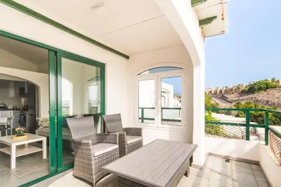 Un balcón o terraza de Home2Book Vista Dorada Sonneland Maspalomas