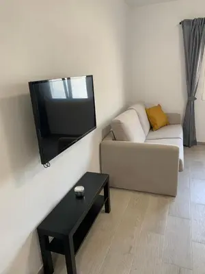 Una televisión o centro de entretenimiento en Villa Rosaura