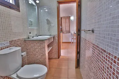 Un baño de Bungalows Santa Fe esquina