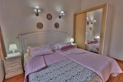 Cama o camas de una habitación en Bungalows Santa Fe esquina