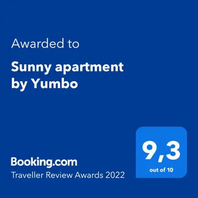 Certificado, premio, señal o documento que está expuesto en Sunny Apartment Tanife by Yumbo