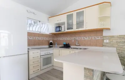 Una cocina o zona de cocina en Bungalow Playa del Inglés
