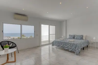 Cama o camas de una habitación en Portomare Delight Private pool & Seaviews Pasito Blanco